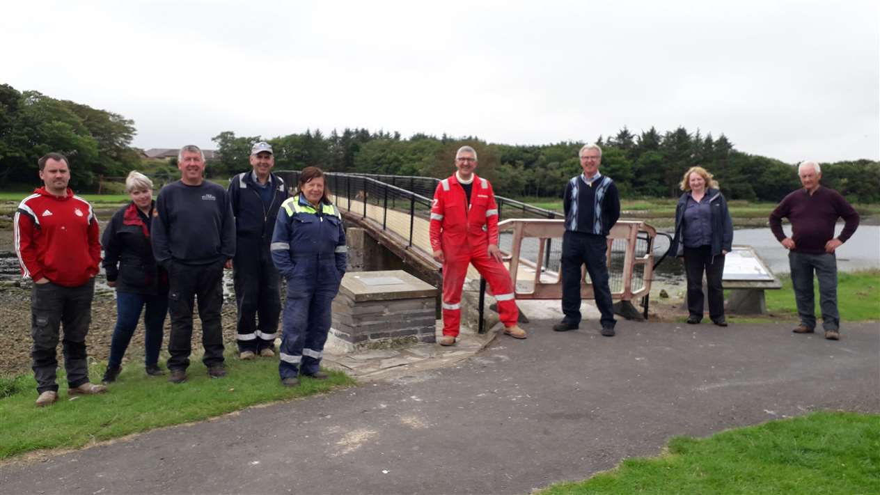 Some of the Wick Paths Group volunteers at the main Coghill bridge after the work had been completed on Sunday.