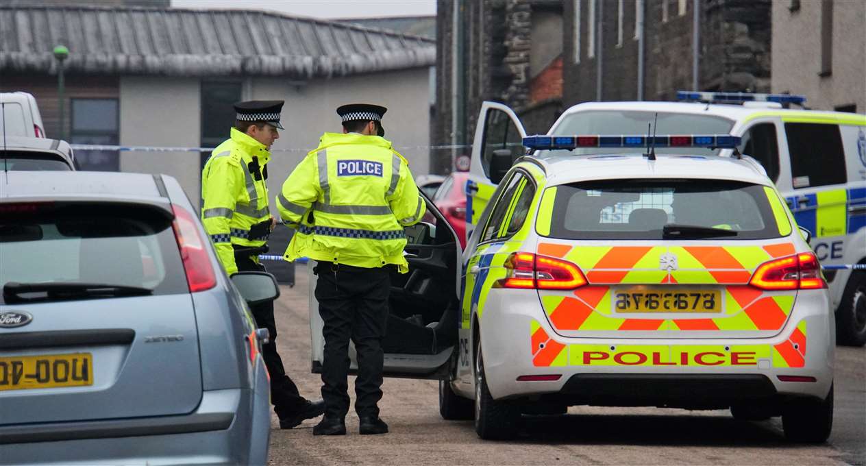 Police attending the scene at Wick's Barrogill Street on Sunday. Picture: DGS