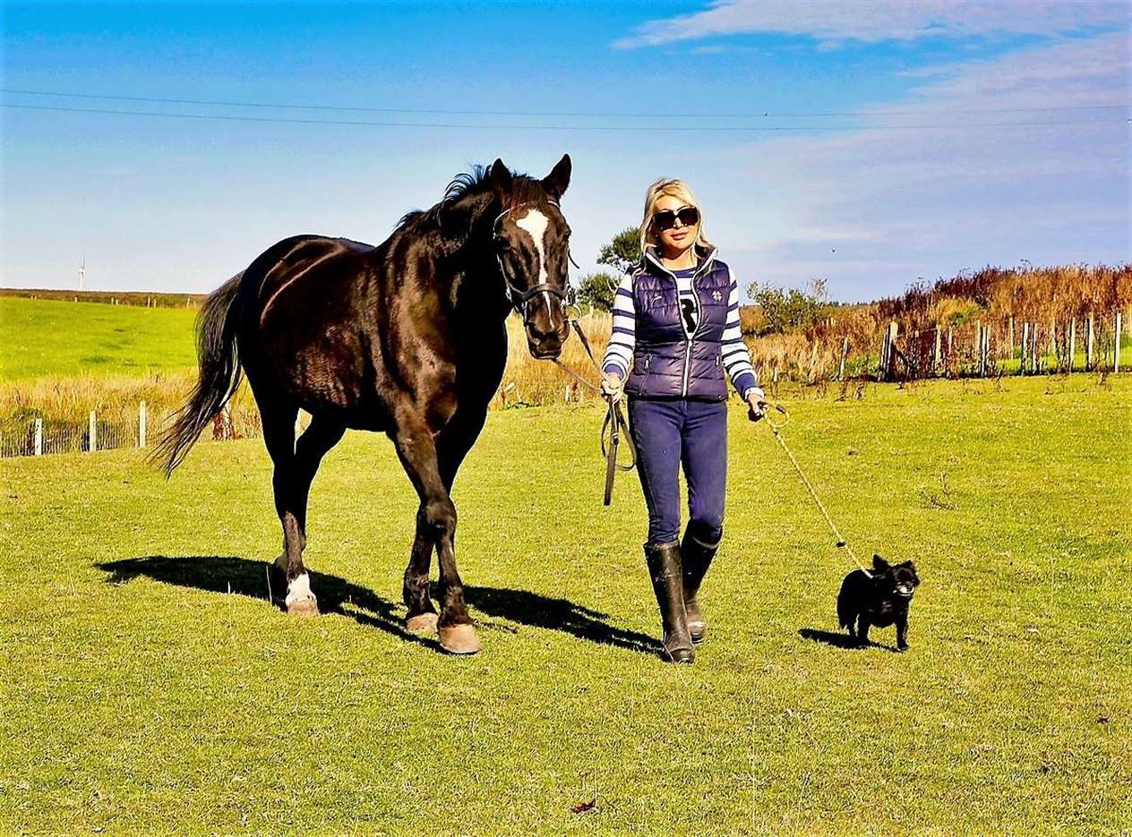 Day 15 of the charity walk. Natalie is pictured with her horse The Great Gatsby along with her constant companion Louis Vuitton the chihuahua.
