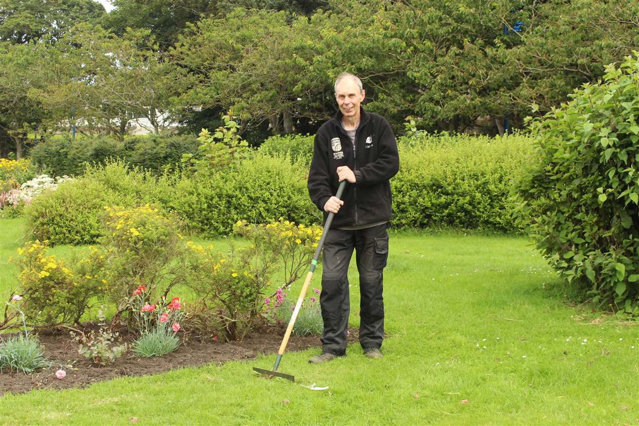 Charlie Bain, a volunteer with Wick Riverside Volunteers and Wick Paths Group, working in the riverside rose gardens on Saturday.