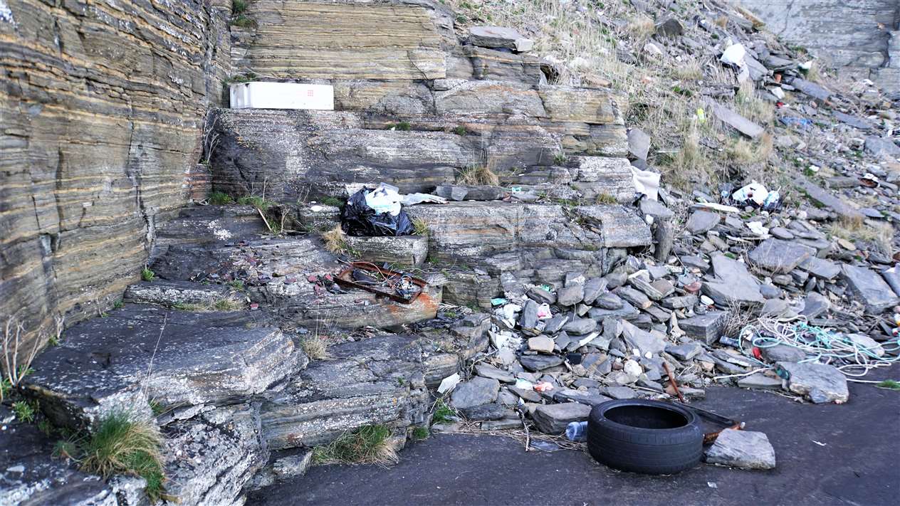 A variety of items thrown off cliffs near the Trinkie by Wick. Picture: DGS
