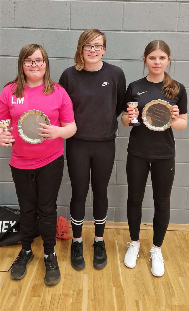 U13 girls' doubles winners Lexie Mackenzie and Ashlyn Gunn with Chloe Mackenzie from Highland Workwear.