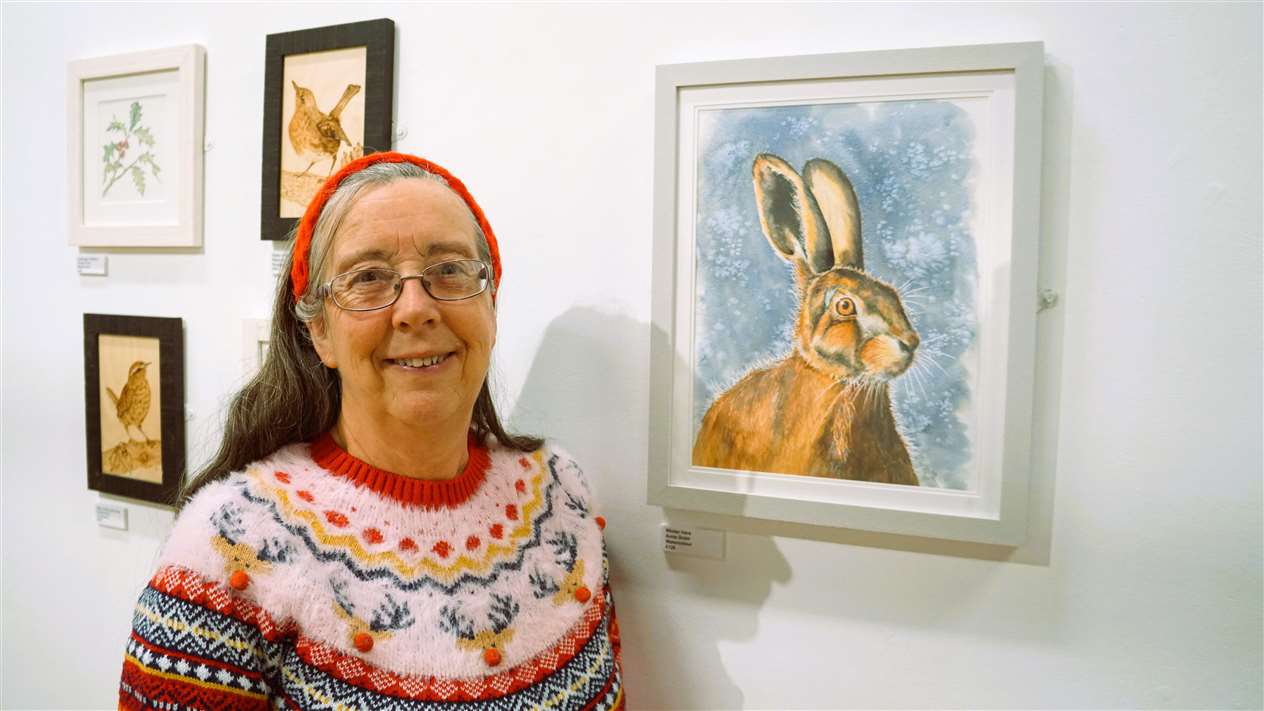 Anne Grain with her watercolour called Winter Hare. Picture: DGS
