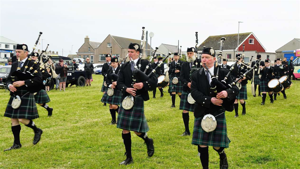 Wick RBLS Pipe Band take to the field. Picture: DGS