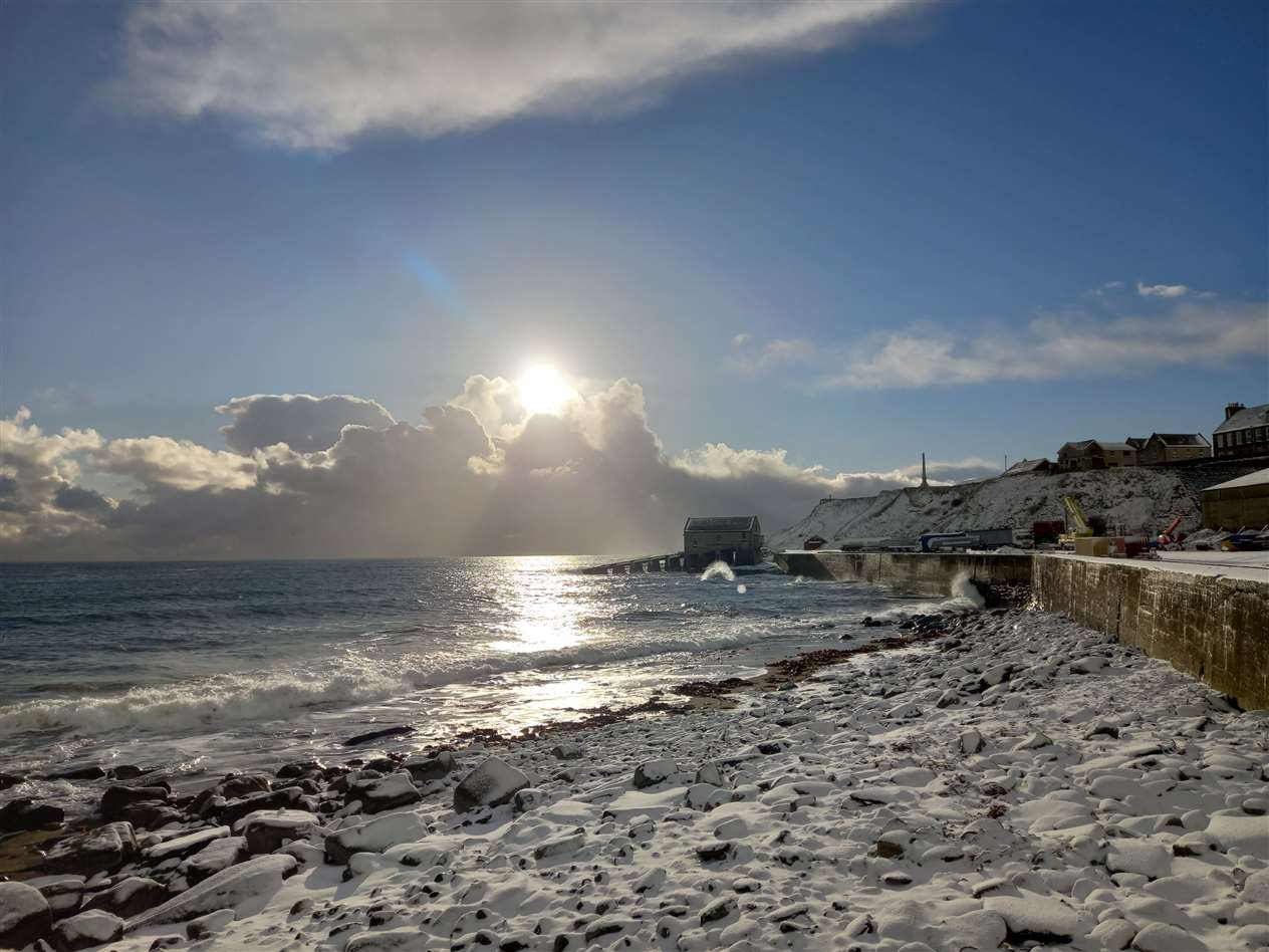 Matthew Towe sent these photos of Wick under a veil of snow in the sunshine.