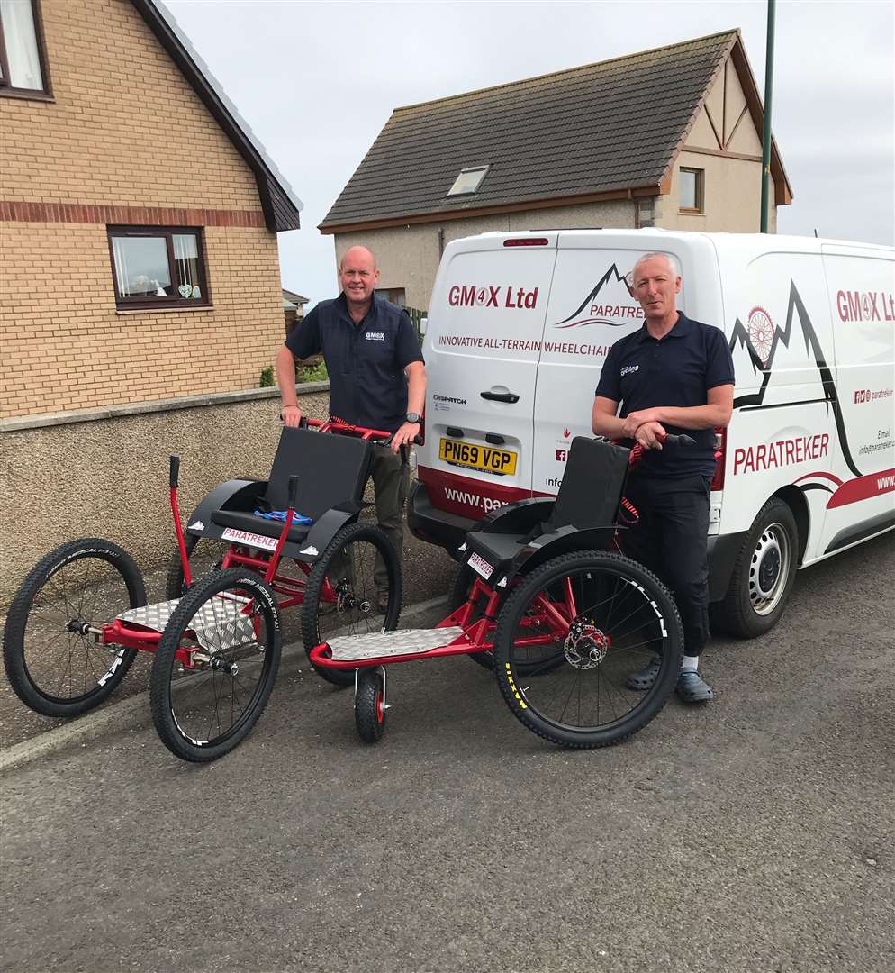 GM4X founder Gordon McGregor (left) delivering the two Paratreker wheelchairs to George Ewing, the Cycling UK development officer in Caithness.