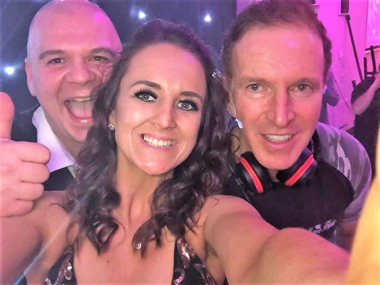 Brian Travers, left, his partner Lynsdsay Gunn and popular DJ George Bowie at the weekend event.
