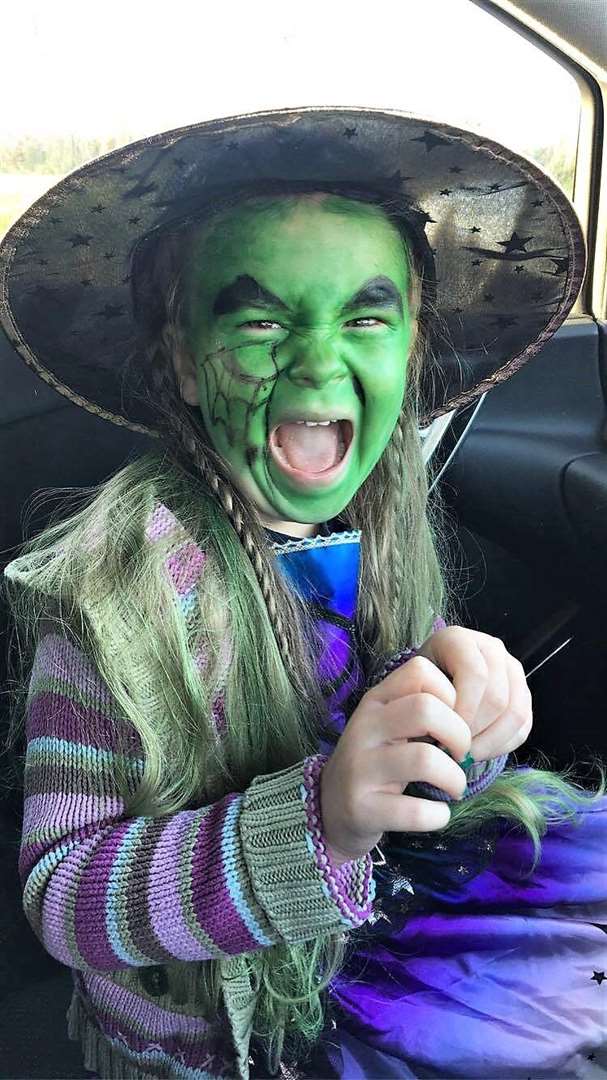 Witchful thinking as four-year-old Eva May stirred up a witch's brew for Halloween.