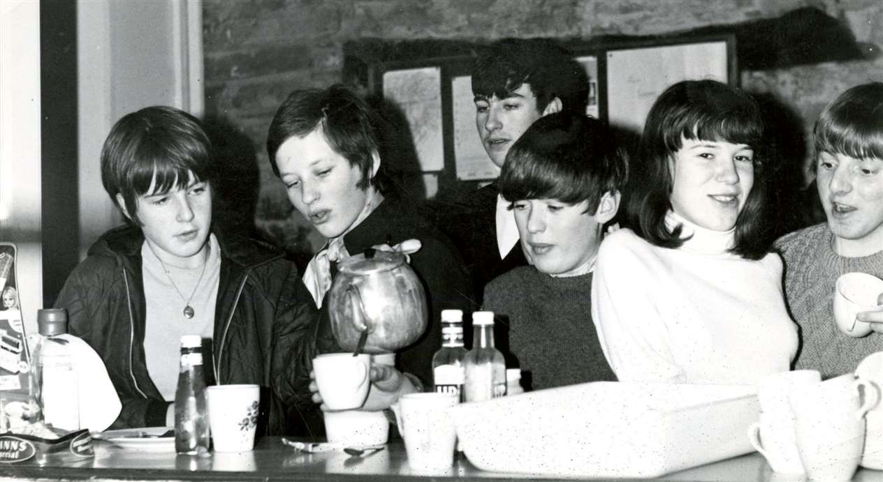 Time for tea for members of Wick Youth Club, a photo from one of books issued by North of Scotland Newspapers.