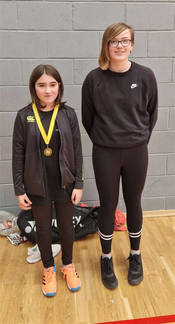 U13 girls' singles consolation winner Blayr Howden with Chloe Mackenzie from Highland Workwear.