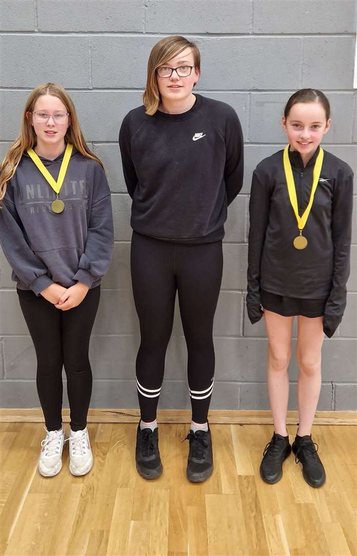 U13 girls' doubles consolation winners Kenzie Sinclair and Sophie Sinclair with Chloe Mackenzie.