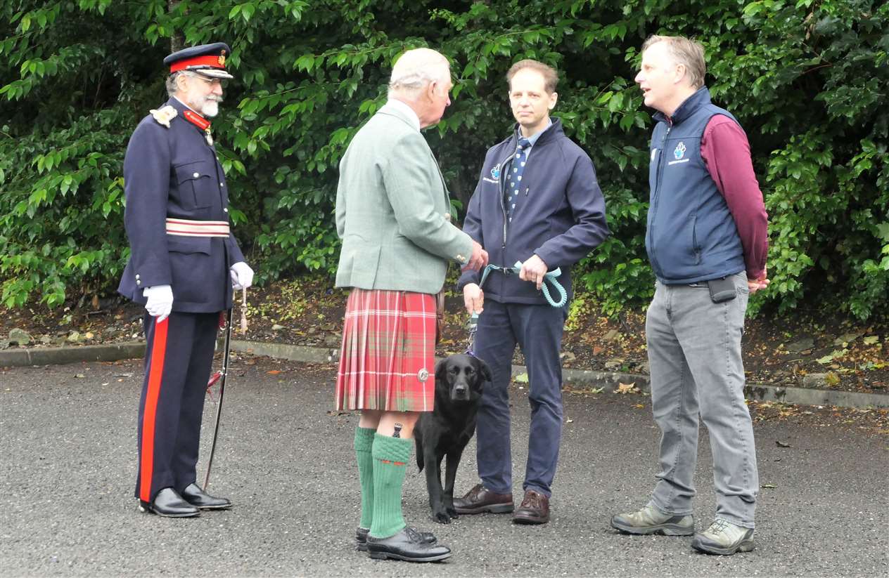Lord Thurso, Milis the dog who received a royal pat on the head, Guy Gordon and Iain MacLean (directors of DS McGregor and Partners Ltd).