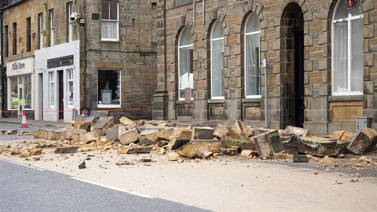 Tons of masonry collpased onto the street from the parapet of a building on Traill Street in Thurso this morning. Picture: DGS