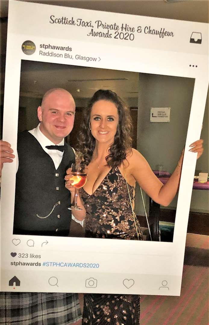 Brian and his partner Lyndsay Gunn celebrate after winning the Scottish Taxi Company of the Year title at a grand ceremony in Glasgow.