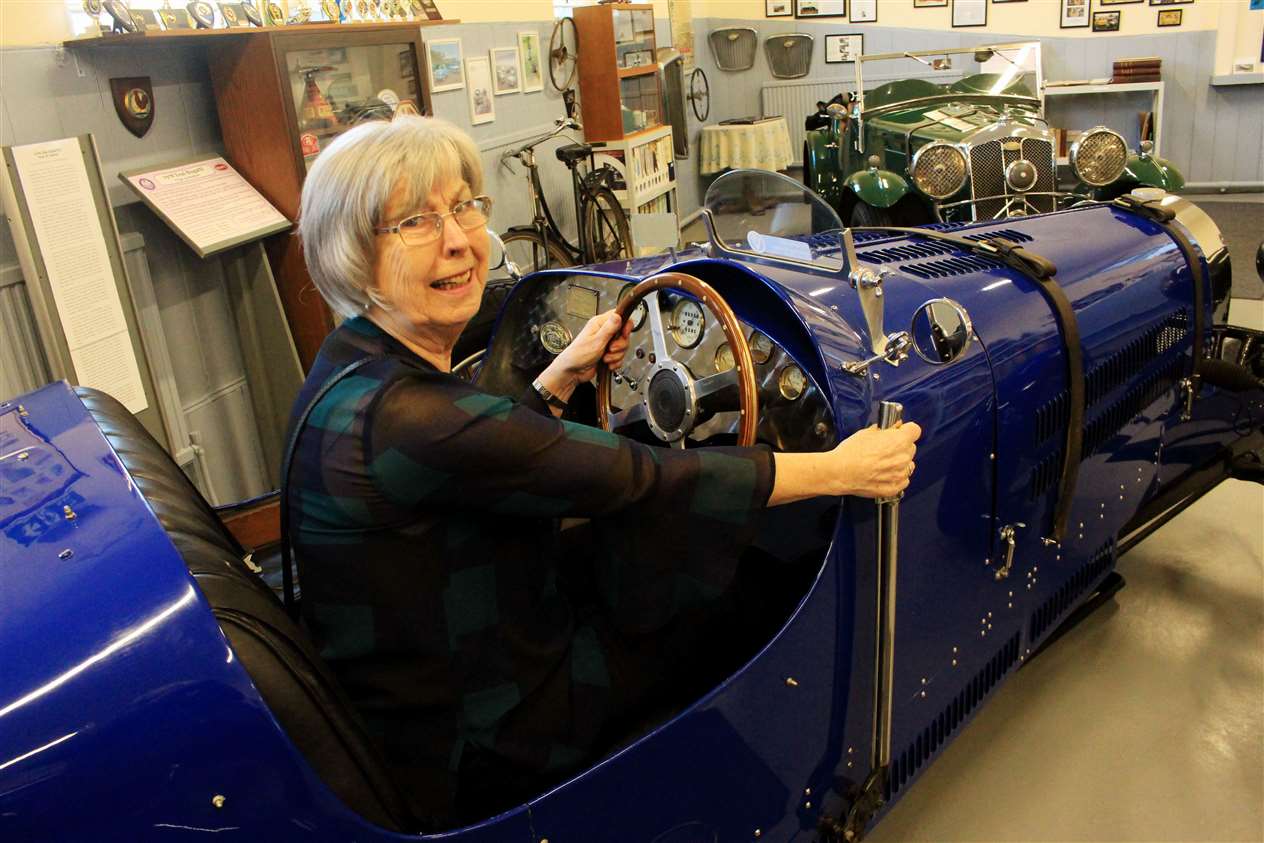 Janet Mowat in a replica Bugatti at the preview evening in Halkirk Heritage and Vintage Motor Centre.