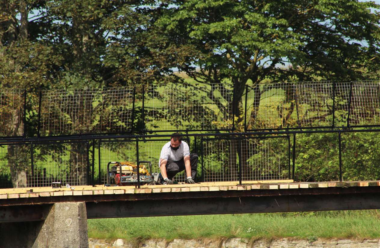 The work included replacing rotting deck timbers before laying a new non-slip fibreglass walkway.