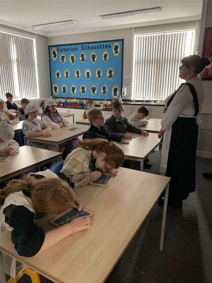 Mrs Emma Sinclair in front of the class.