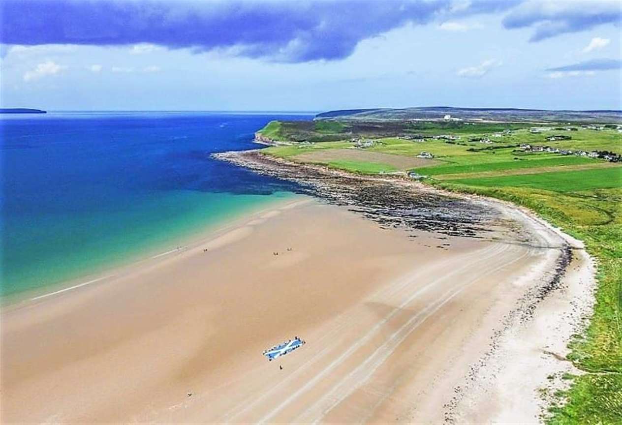 Barry Scollay from Wick captured dramatic images of the giant Saltire on Dunnet beach on Saturday afternoon.