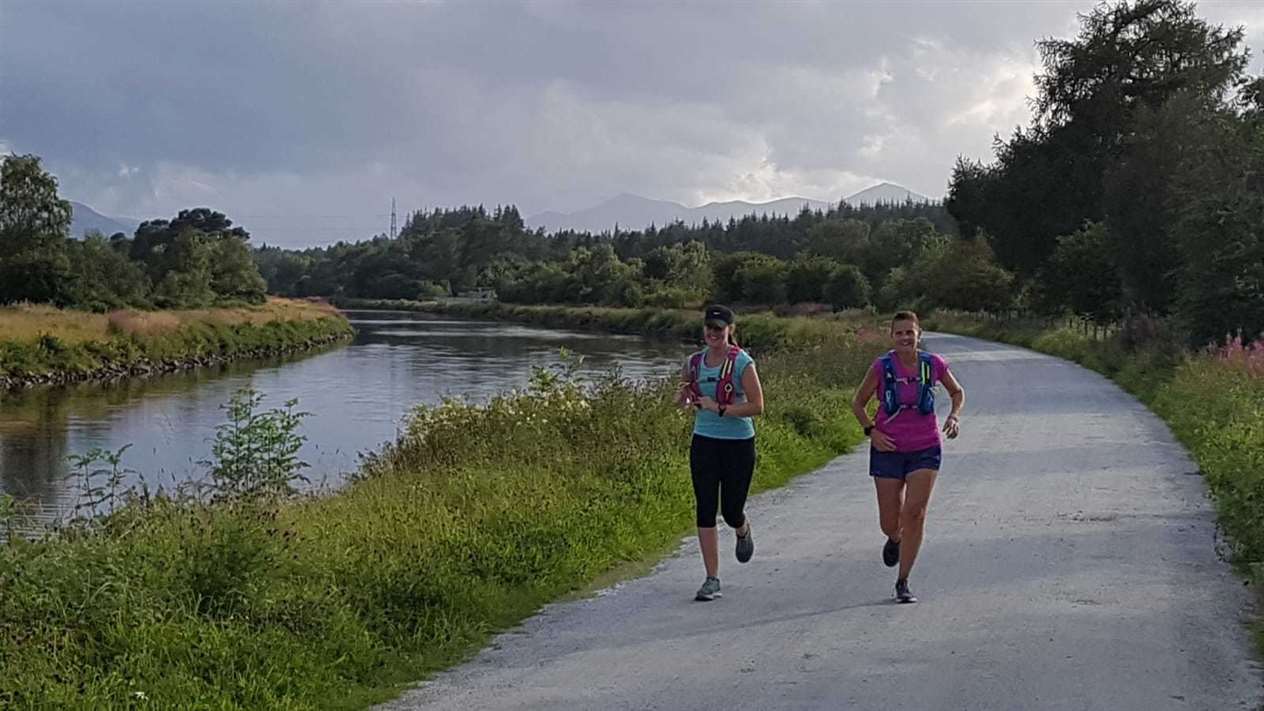 Sophie running the Great Glen Ultra with daughter Oonagh.