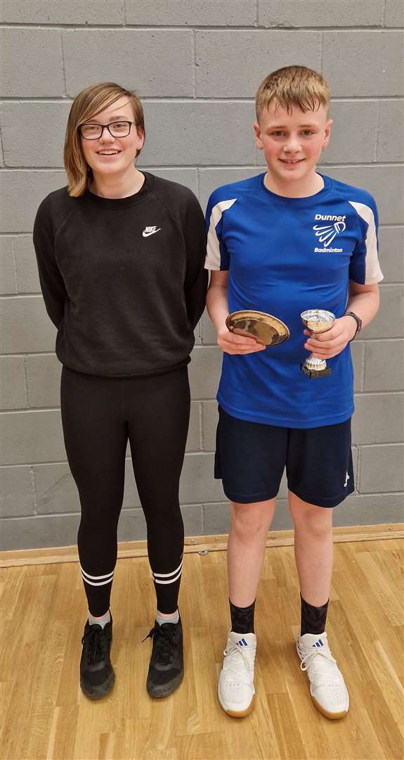 Under-13 boys' singles winner Dhaill Mackay with Chloe Mackenzie from sponsor Highland Workwear.
