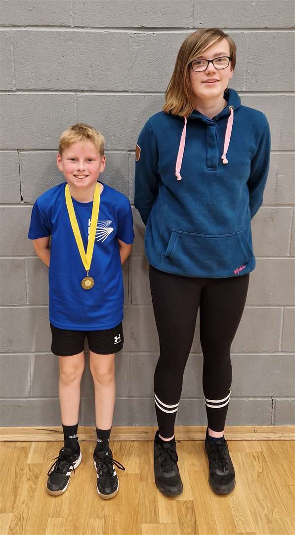 Boys' singles consolation winner Liam Sinclair with Chloe Mackenzie of Highland Workwear.