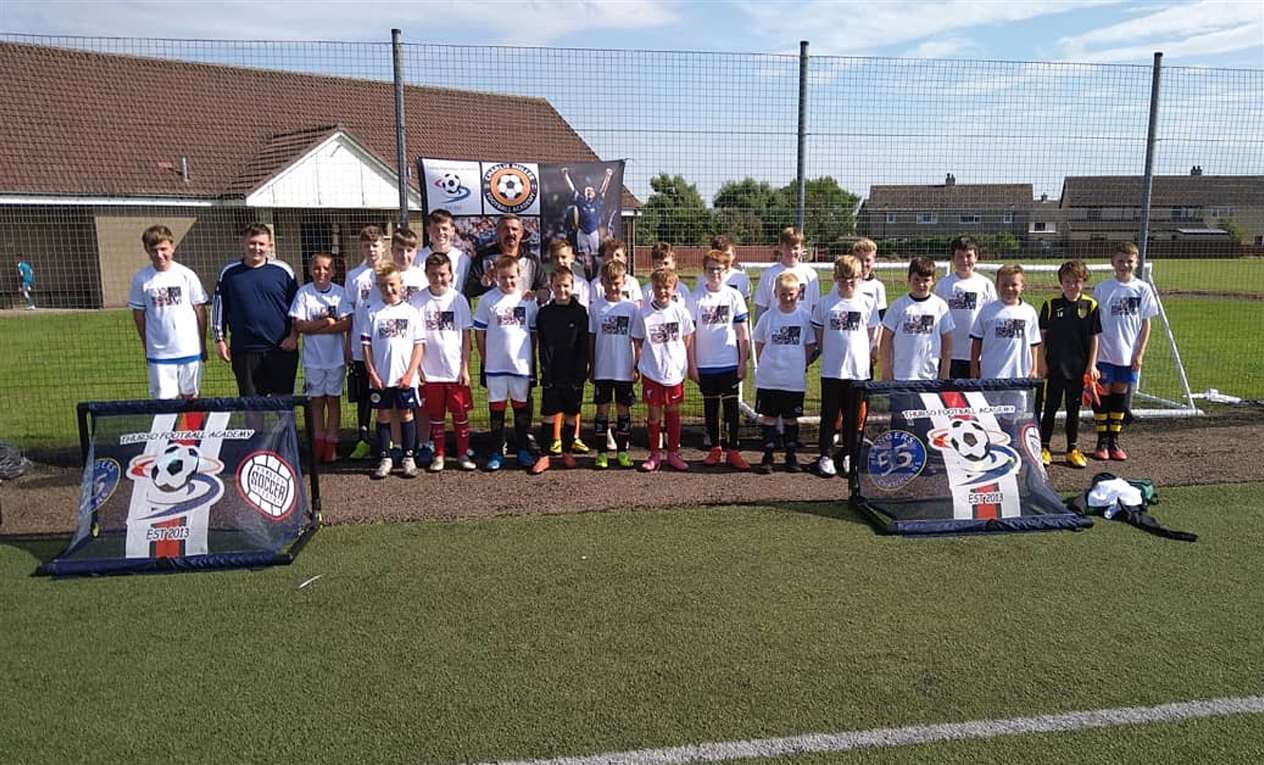 Charlie Miller with the 10-15 age group during one of last week's sessions in Thurso.