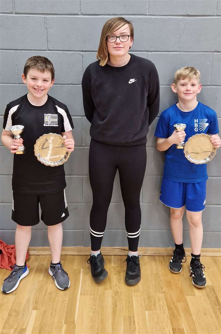 U13 boys' doubles winners Angus Mackay and Rory Nicolson with Chloe Mackenzie from sponsor Highland Workwear.