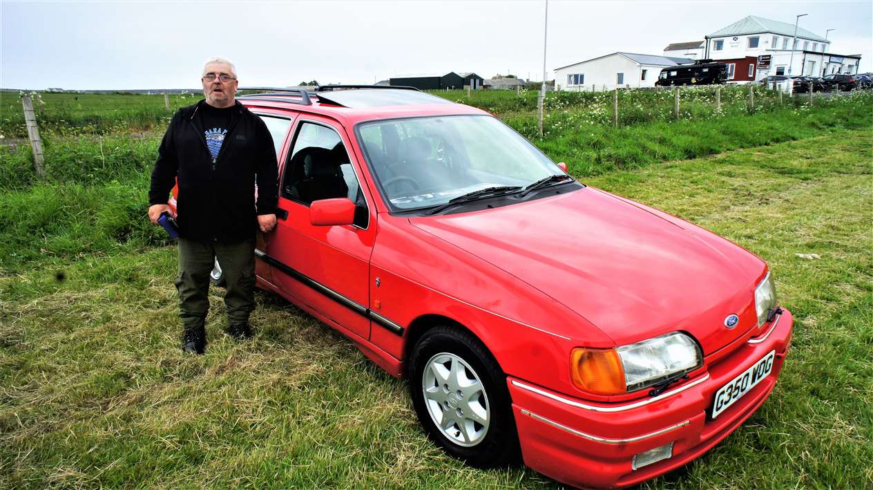 John Henderson from Lybster with his 1990 Ford Sierra. Picture: DGS