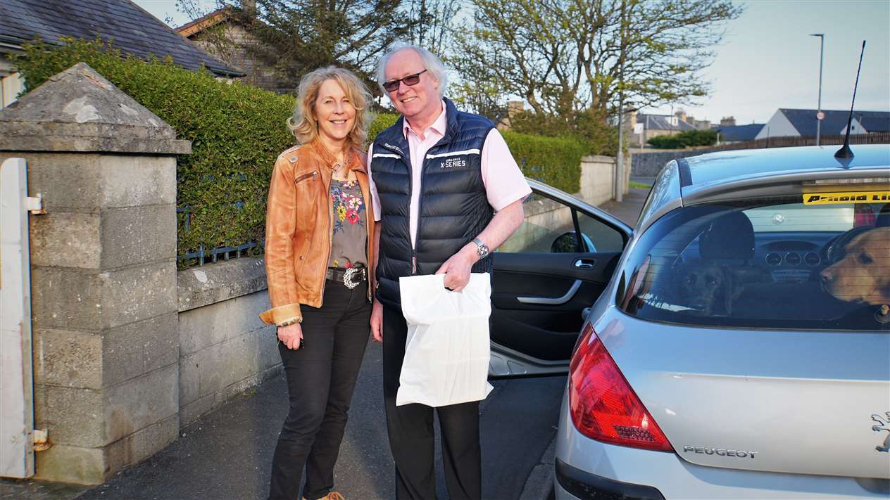 Murray and Ellie Lamont preparing to make meals-on-wheels deliveries. Picture: DGS