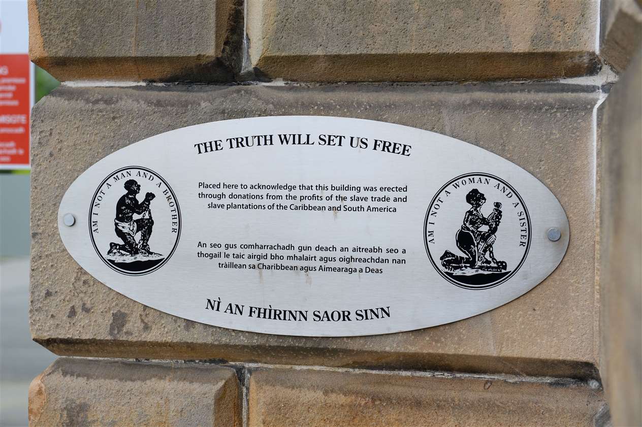 A plaque at UHI headquarters makes clear the building's links to slavery.