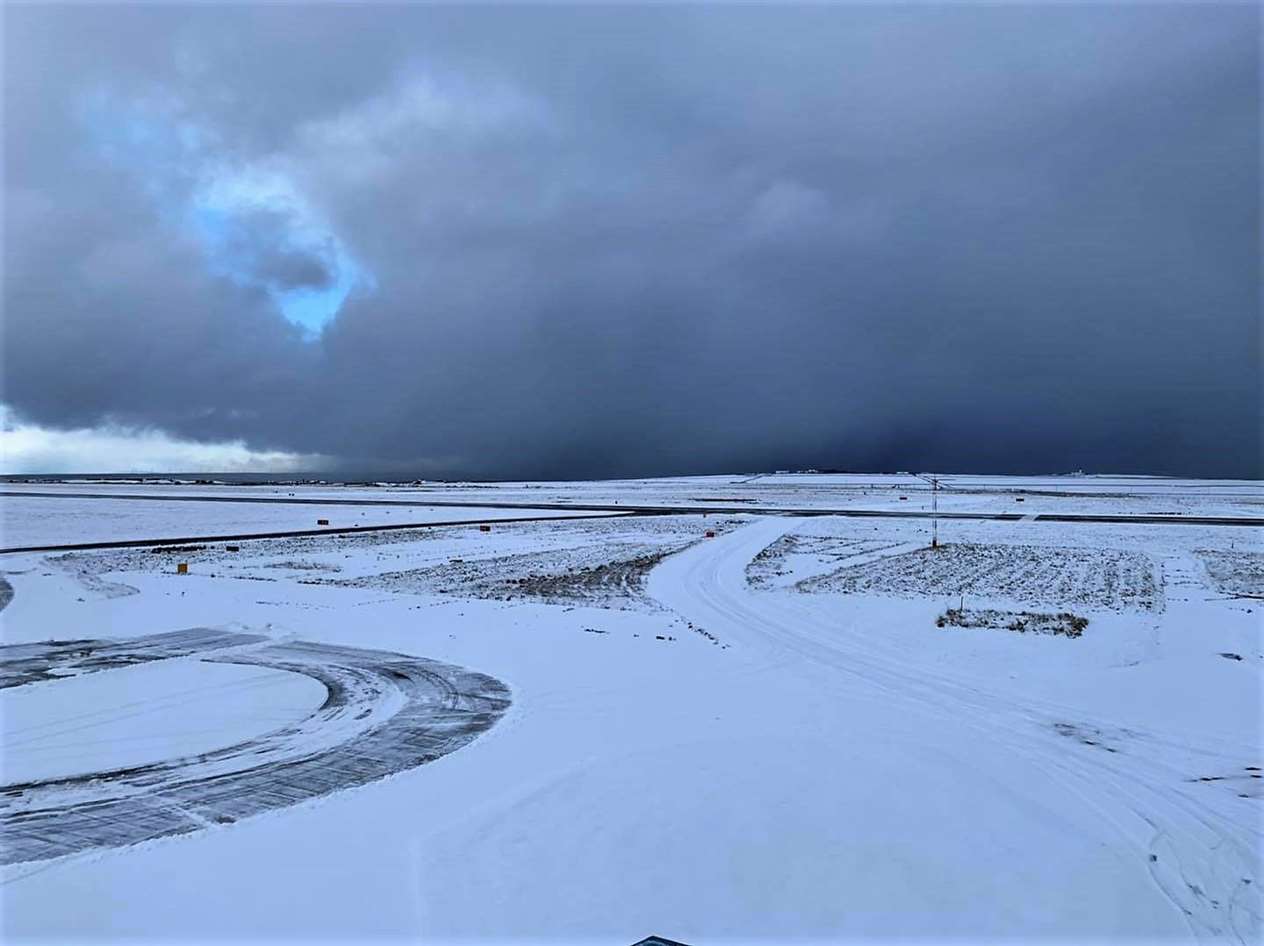 Wick airport had to close until the runway could be cleared of snow yesterday.