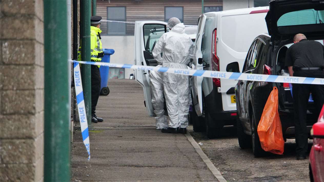 Police attending the scene at Wick's Barrogill Street on Sunday. Picture: DGS