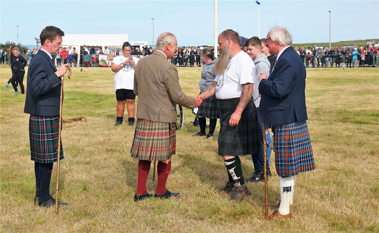 King Charles congratulates Wounded Highlanders team leader Jim Holborn. Picture: DGS
