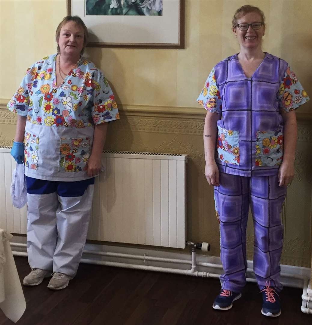 Pulteney House staff Anne Craigie and Fiona McPhee proudly wearing their colouful new scrubs.