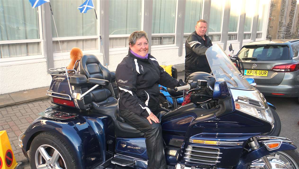 Pint-sized Linda Gallon sits astride the huge motor trike which she bought at the age of 62. Pictures: DGS