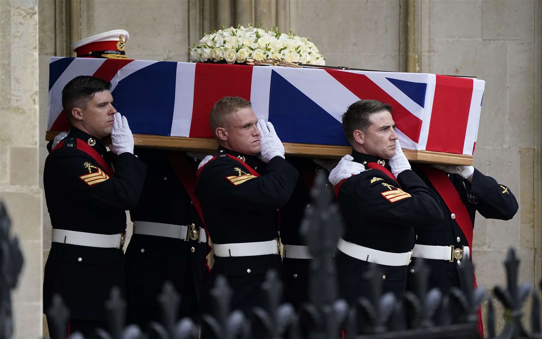 Pallbearers carry the coffin of Major General Matthew Holmes, former head of the Royal Marines, out of Winchester Cathedral following his funeral service (Andrew Matthews/PA)