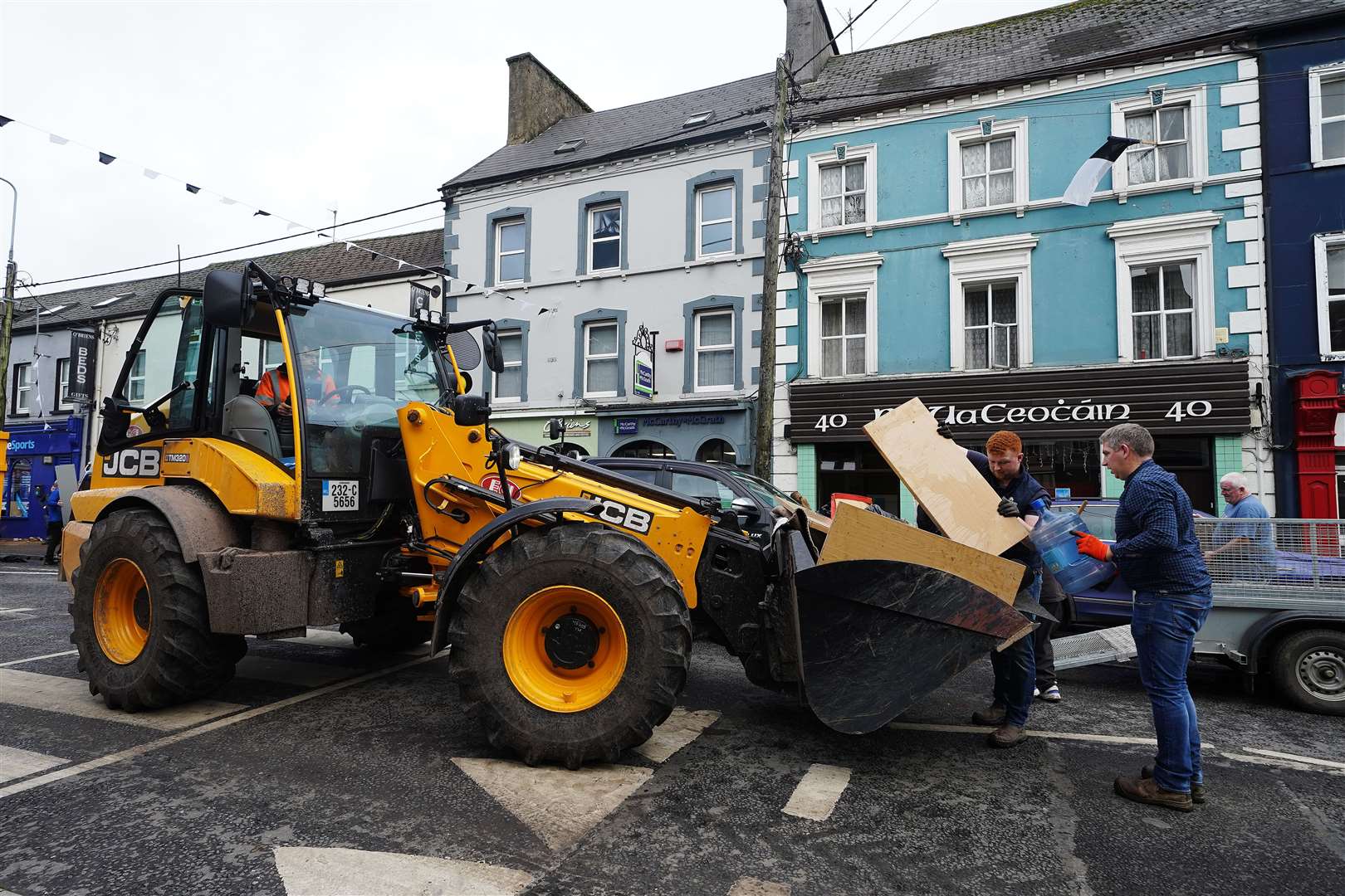 Communities in Co Cork rallied together to help clean up damage caused by flooding (Brian Lawless/PA)