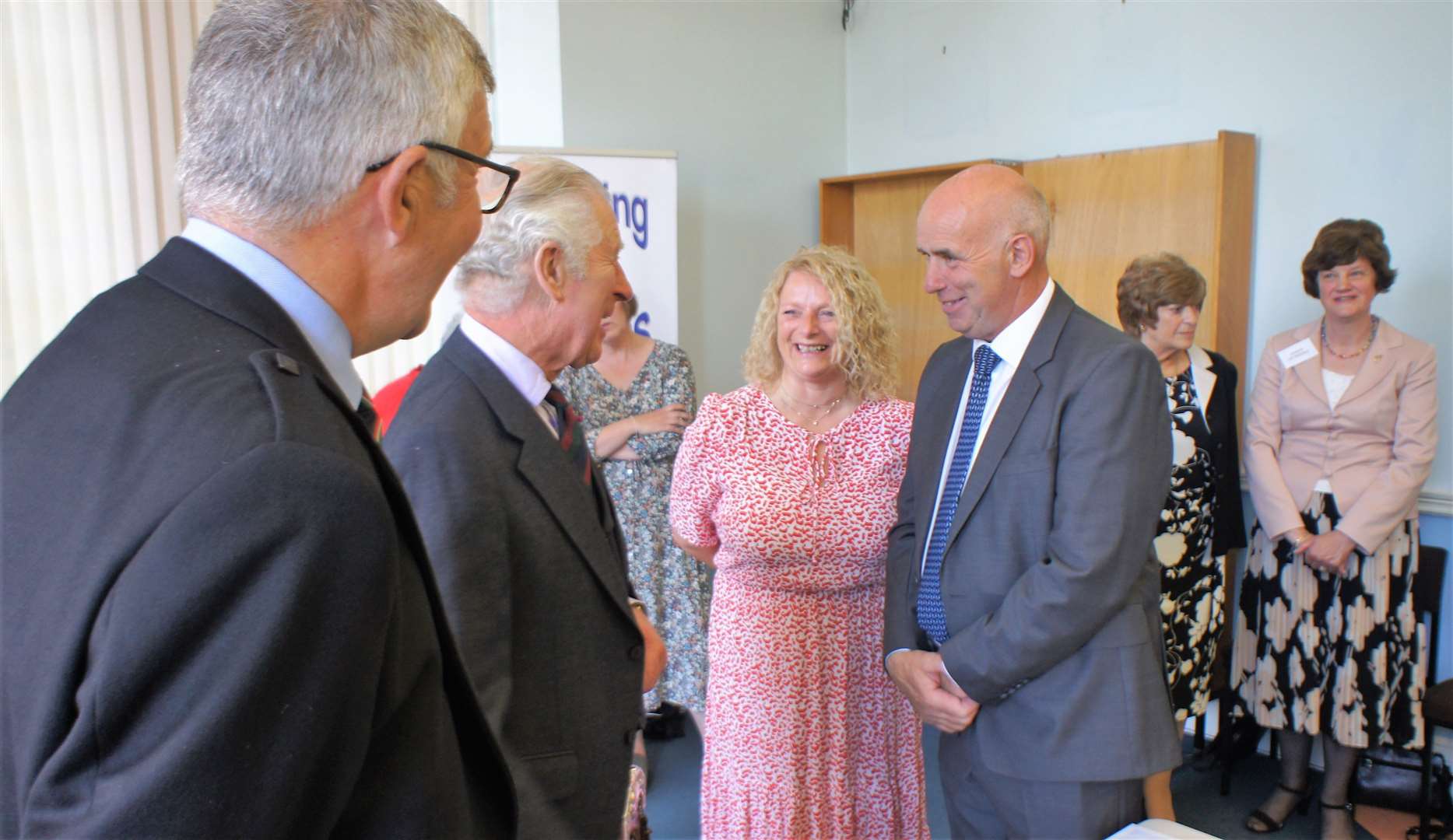 The Duke of Rothesay chatting to Joanna Coghill and Donald Harper of Wick Flower Baskets. Picture: DGS