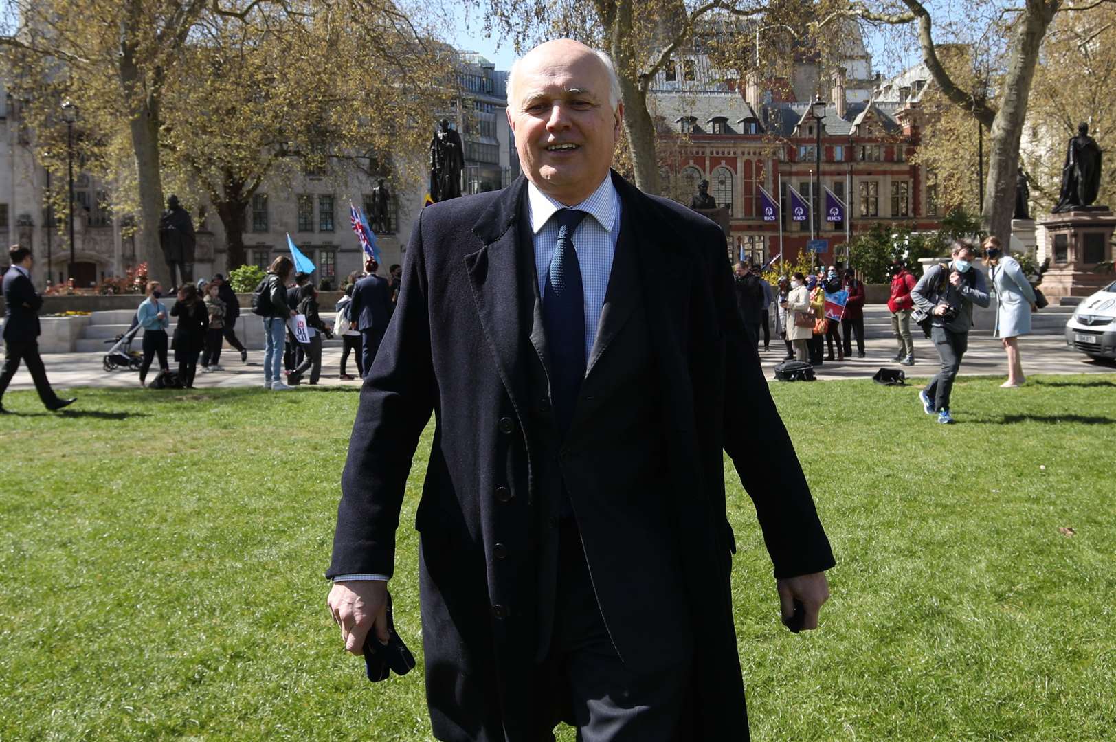 Iain Duncan Smith after he joined Uighurs at a demonstration in Parliament Square, London, in April, 2021 (Yui Mok/PA)