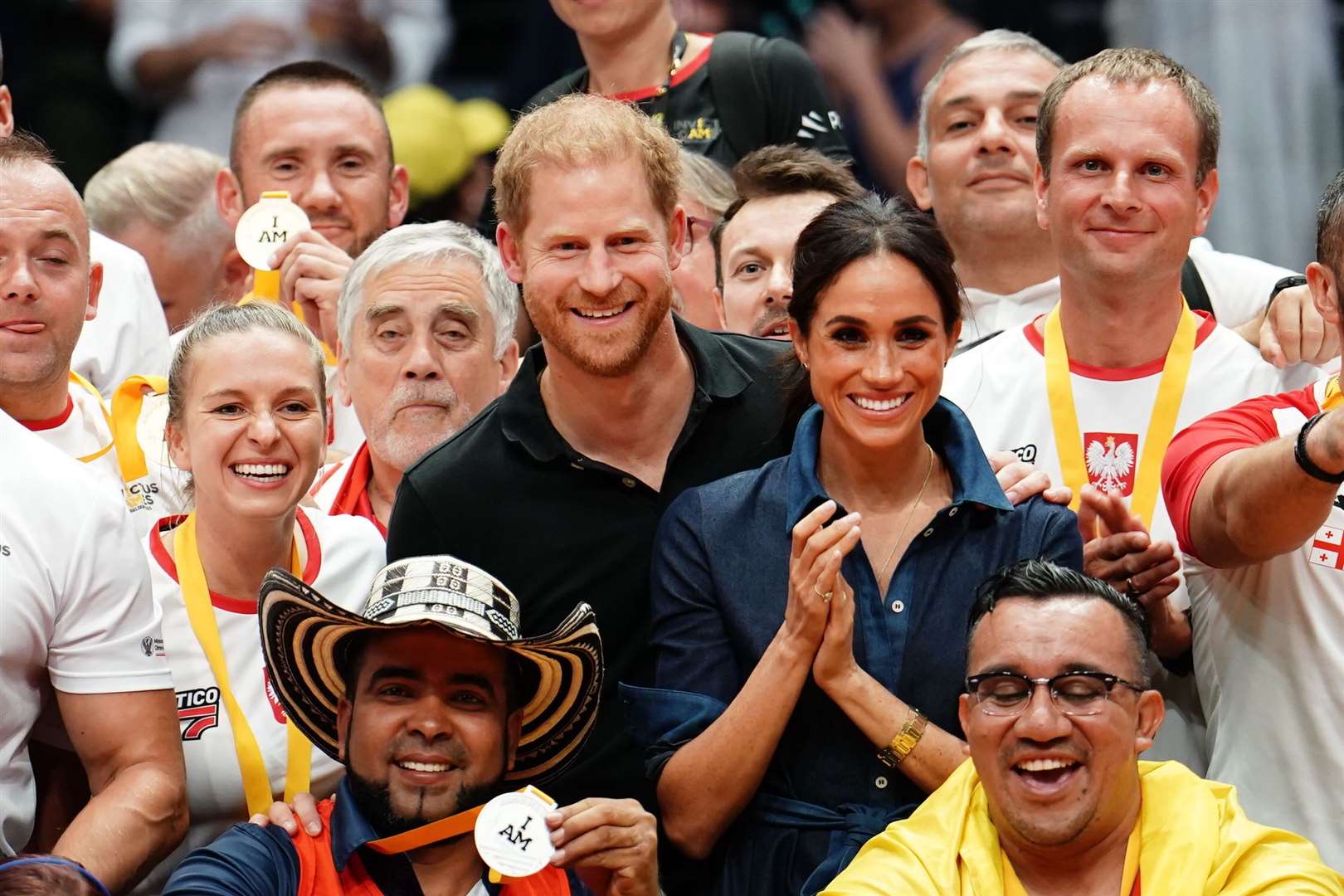 The Duke and Duchess of Sussex with medal winners at the sitting volleyball final during the Invictus Games in Dusseldorf in September (Jordan Pettitt/PA)