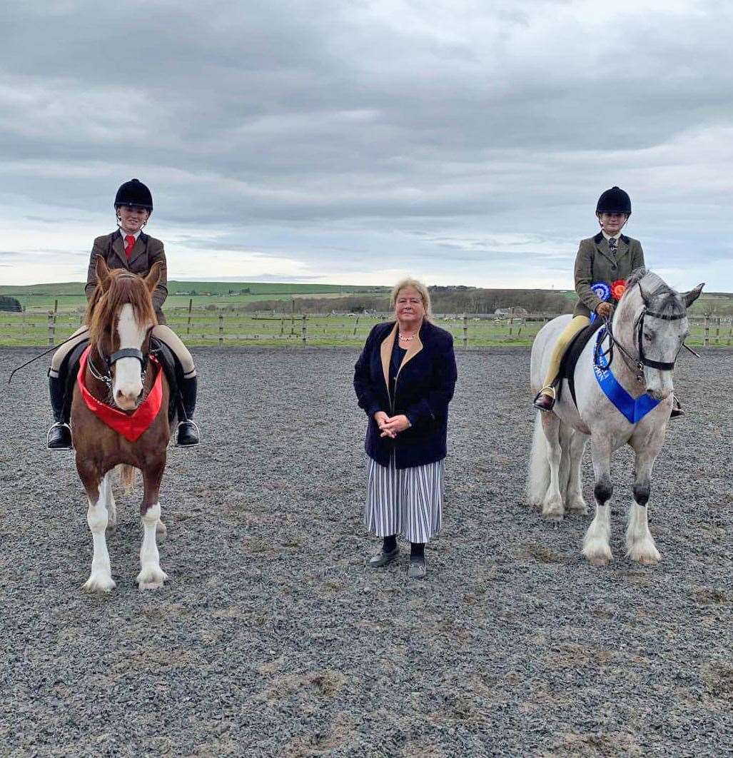 Champion ridden pony Bryony Jack and Donys Stand N Deliver (left) and reserve Emily Donn with Bobbys Choice, along with judge Jane McNaught.