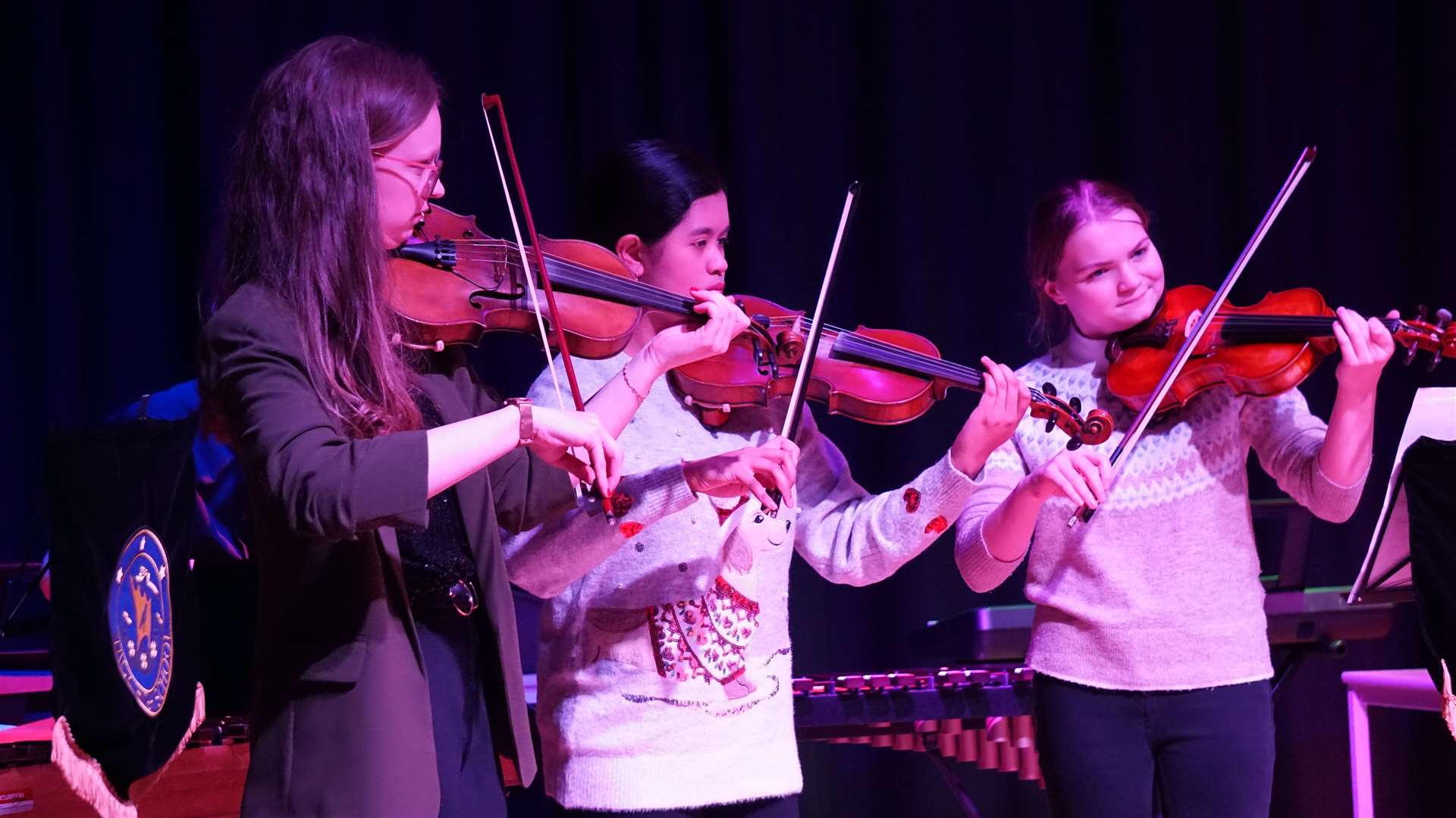 From left, Eilidh Patterson, the music teacher at Wick High School, Claire McAdam, S6 and Blythe Bullen, S4 (part of Trad Group). Picture: DGS