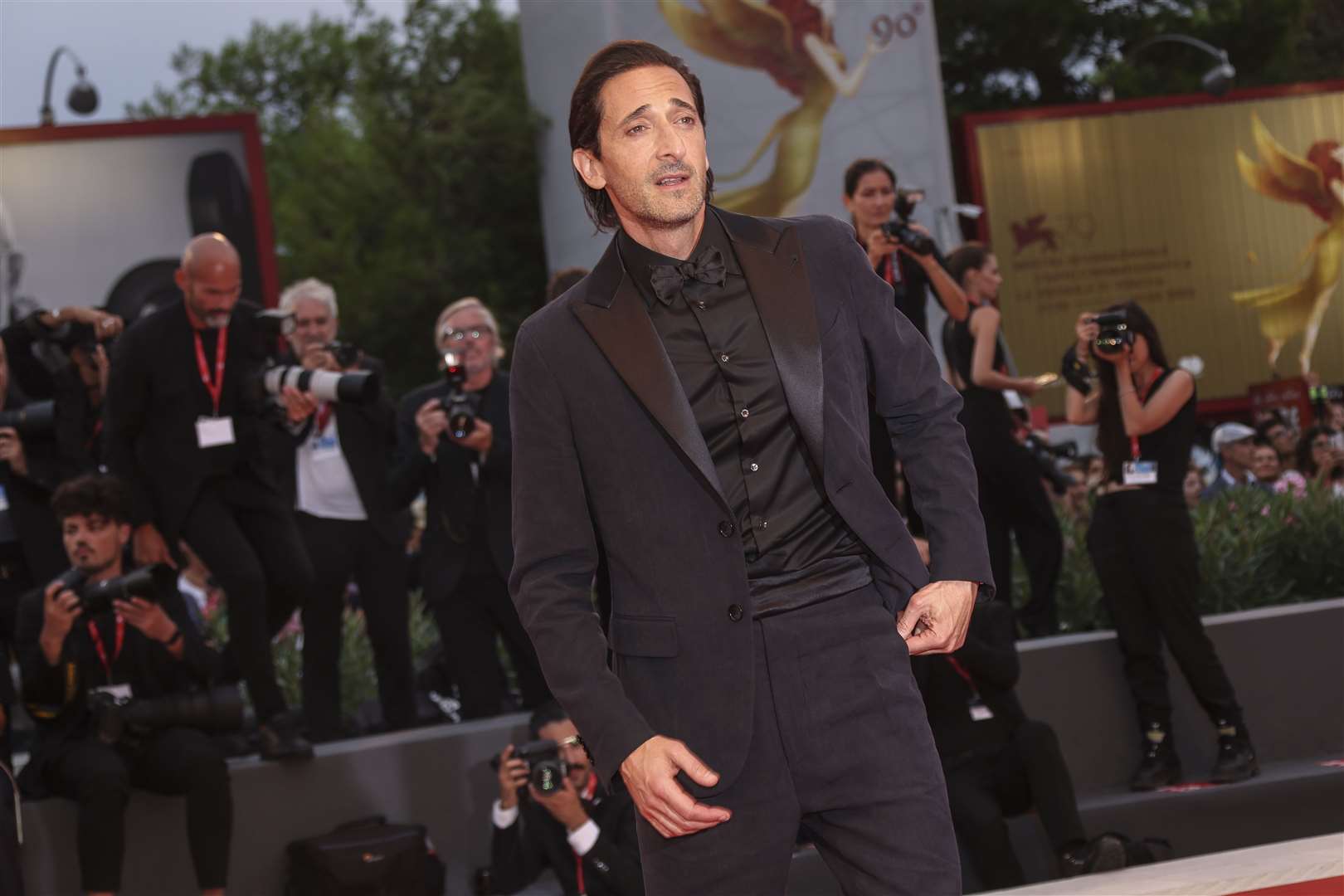 Adrien Brody poses for photographers upon arrival at the premiere of the film Blonde (Joel C Ryan/Invision/AP)