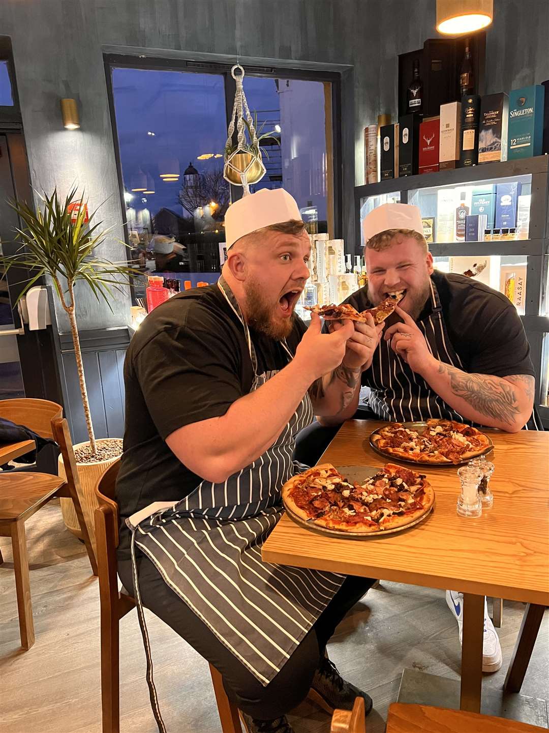 Tom and Luke enjoying a pizza the action. Picture: Sutor Creek
