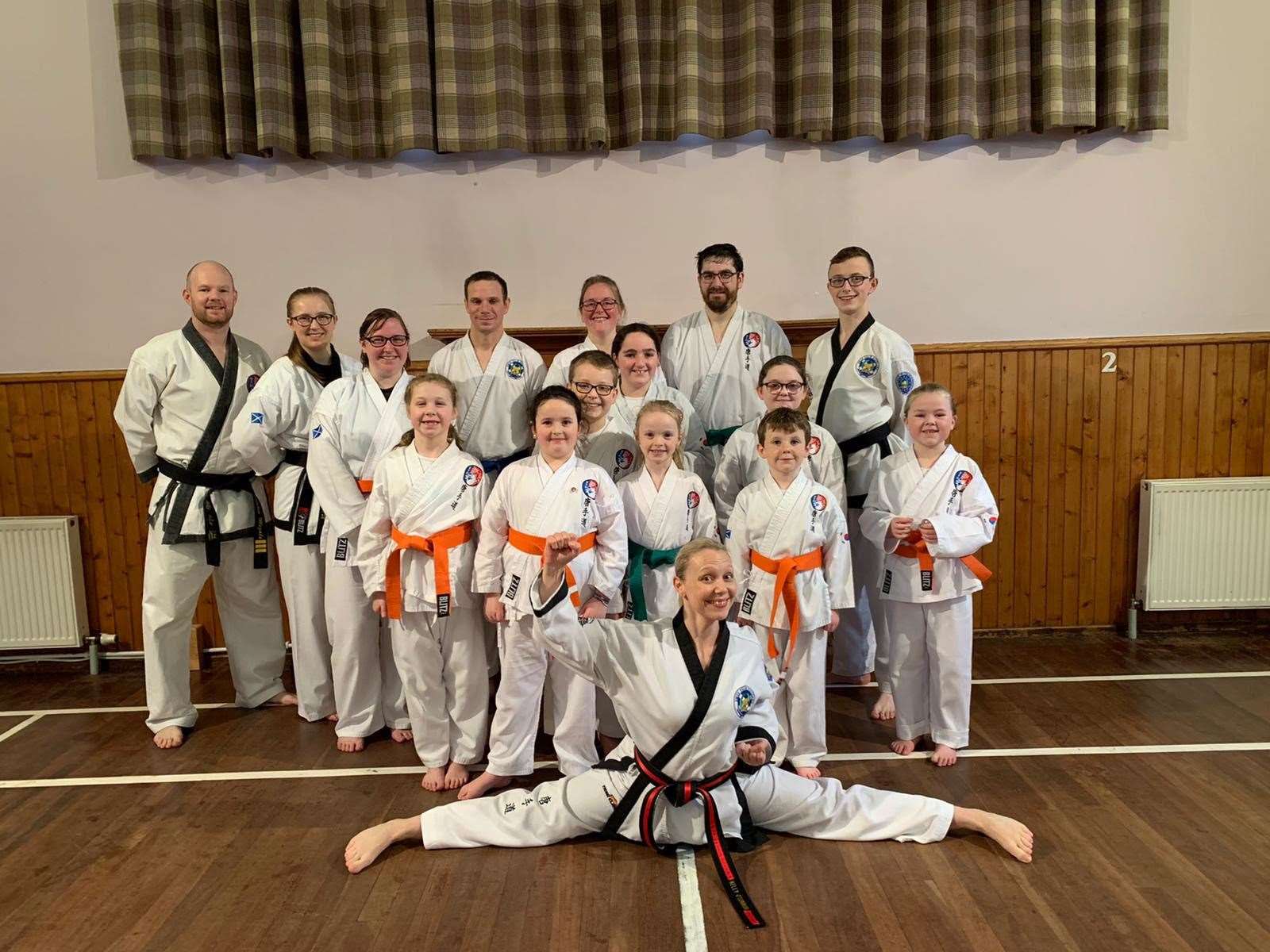 Club instructors Stephen Mezals and Arizona Morence (back, left) and Master Kelly O’Connor (front) with the successful Caithness students and guests from Inverness Tang Soo Do.