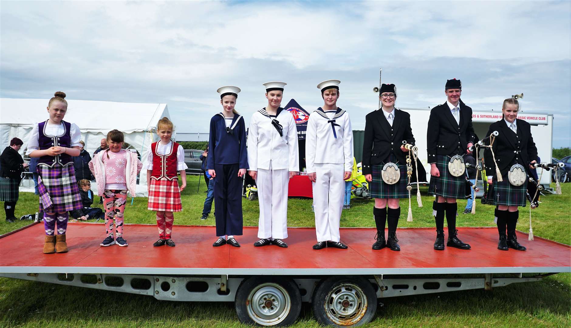 Young Highland dancers and pipe band members take the stage for a portrait picture. Picture: DGS