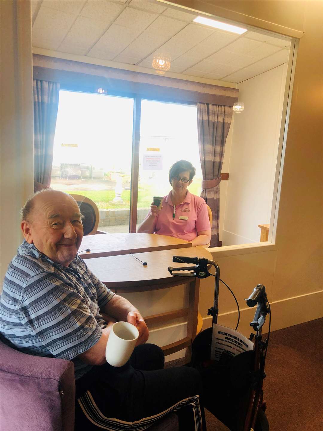 Resident Willie Cuthbertson and activities co-ordinator Mandy Wilson in the new visiting suite at Seaview House.