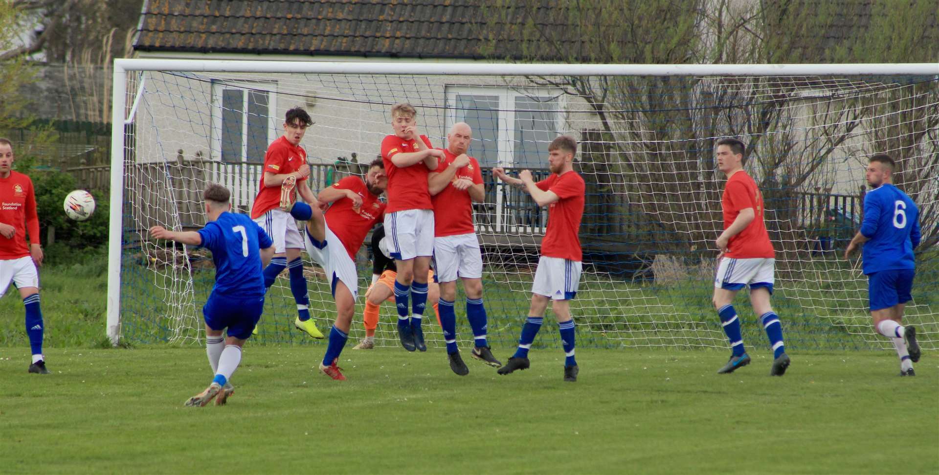 Wick Thistle's Sam Barclay sends a free kick narrowly wide of goal.