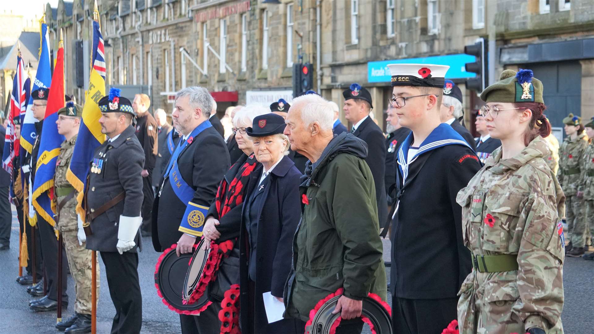 Parade members line up in front of Thurso's War Memorial. Picture: DGS