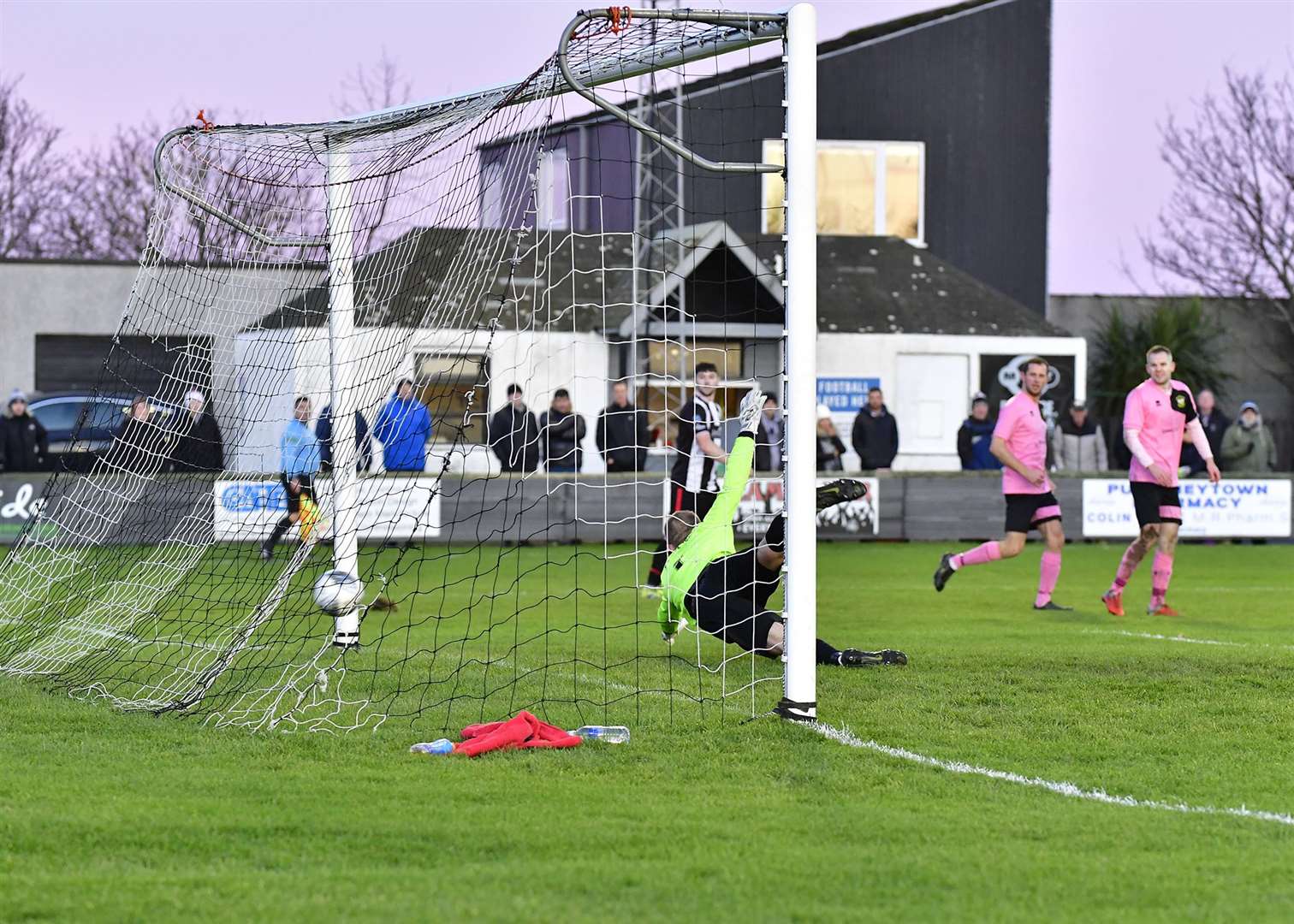 A shot from Wick Academy's Jack Henry flies past Jake Williamson to make it 1-1 in last weekend's home game against Clachnacuddin. Picture: Mel Roger